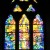 East window depicting Alpha & Omega with a radiating cross